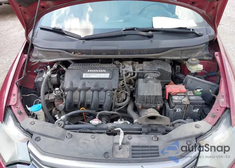 2010 Honda Insight Ex z USA, uszkodzony, nr VIN JHMZE2H7XAS041844